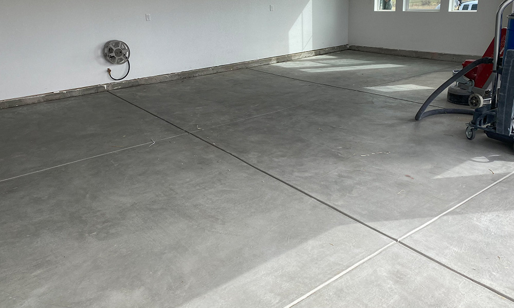 garage interiors with concrete floors before sealing centennial co