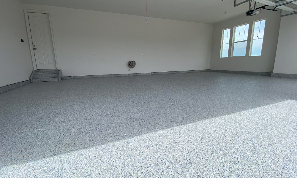 garage interiors with epoxy flooring installed centennial co